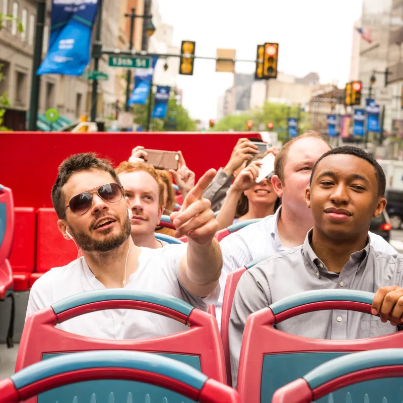 People riding the hop on hop off bus tour in Philadelphia
